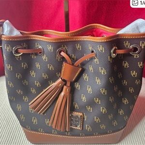 Dooney & Bourke Black and Brown Tassel Bucket Bag